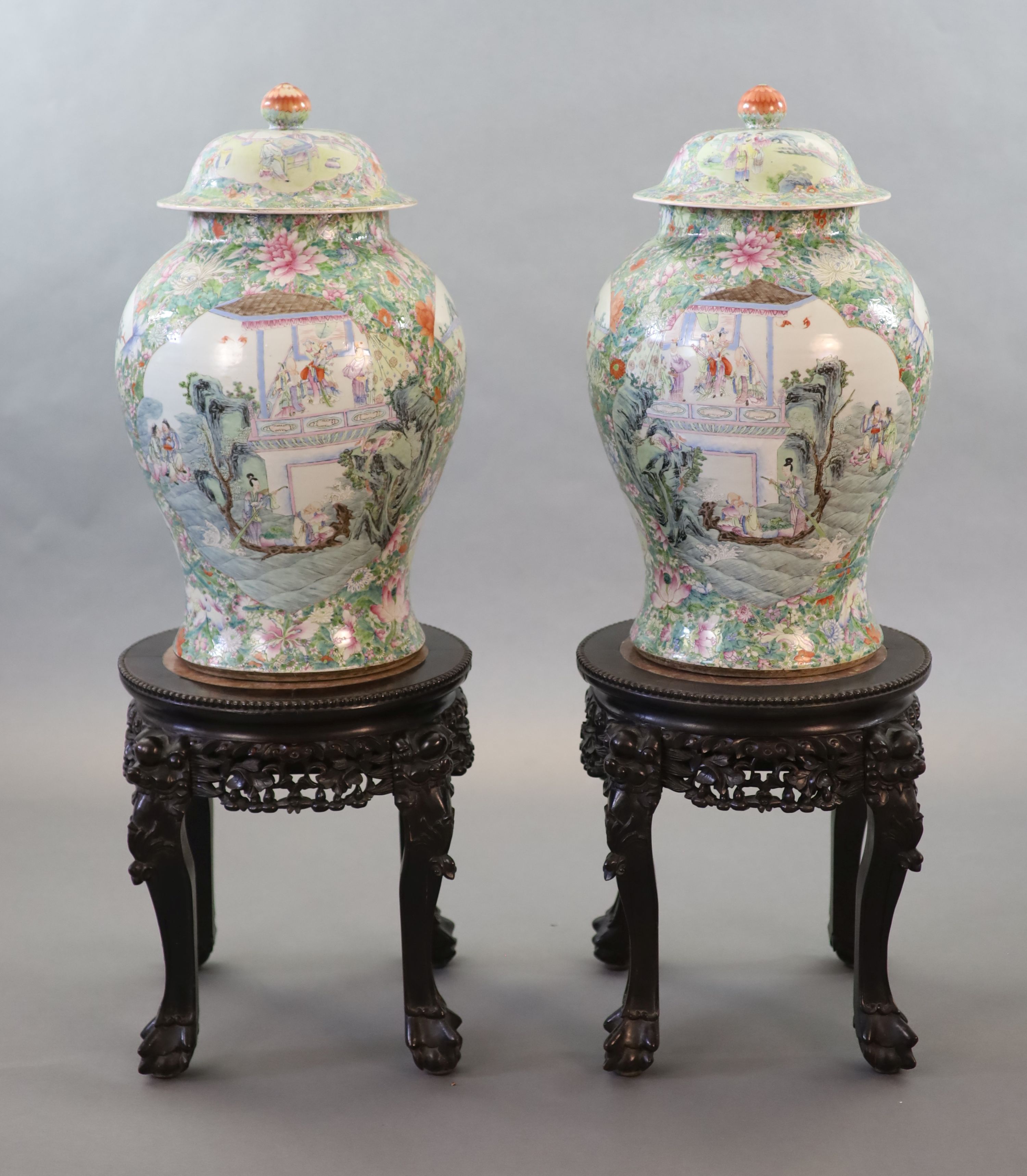 An impressive pair of Chinese famille rose ‘eight immortals’ vases and covers, late 19th century, Total height 113.5 cm including stands